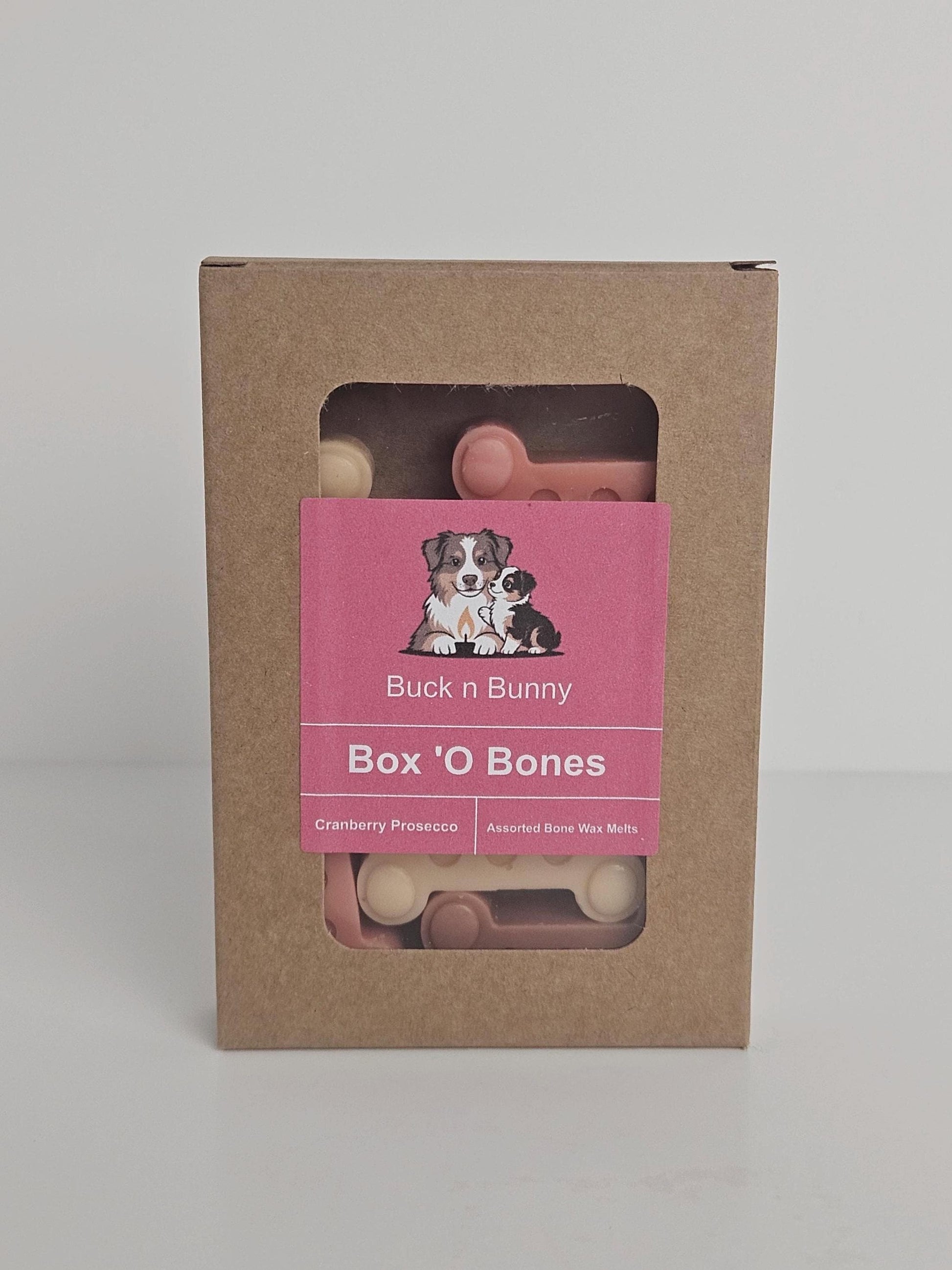 Box 'O Bones wax melts, cranberry prosecco realistically colored and shaped dog treat wax melts.